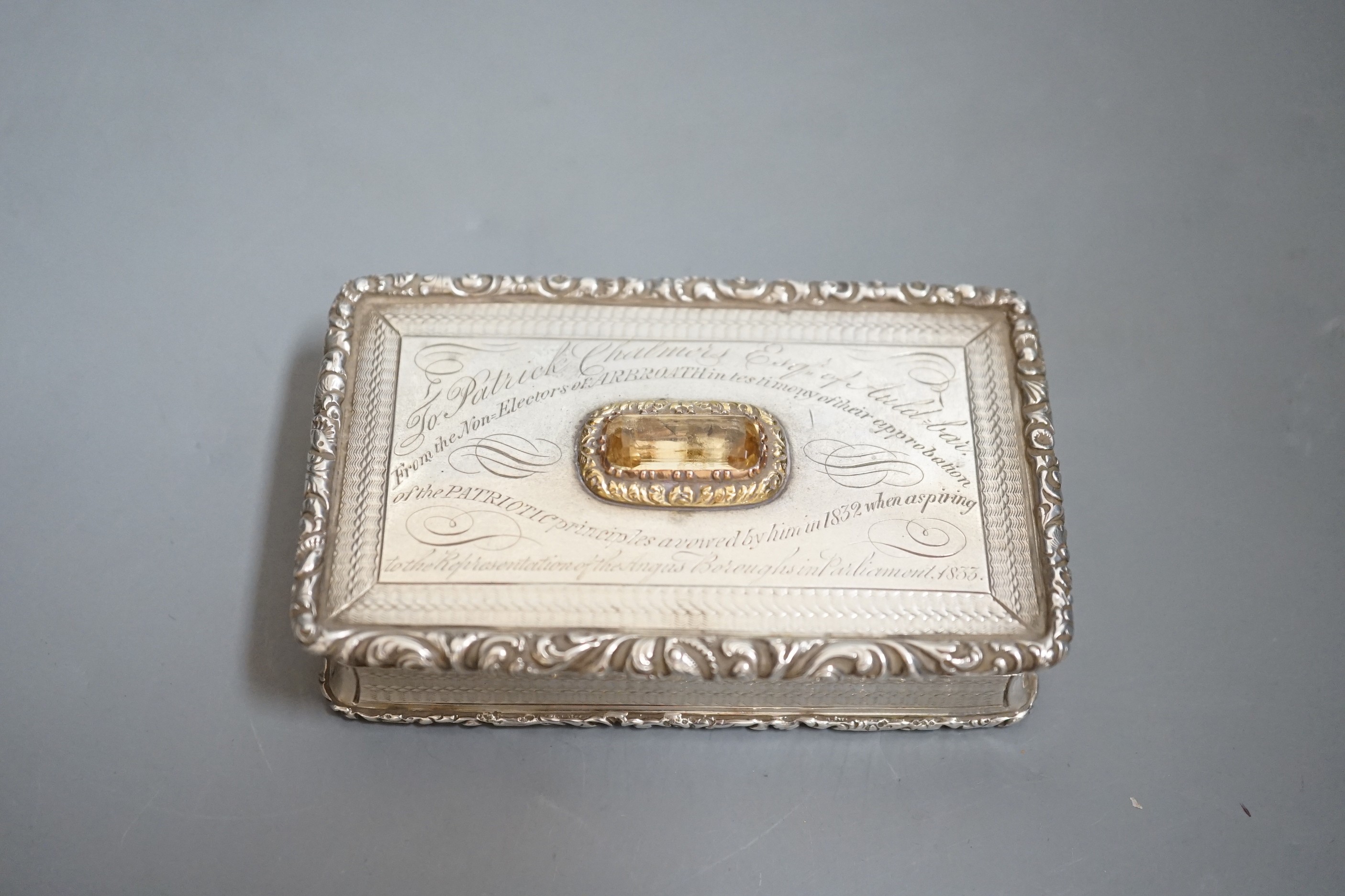 A William IV silver and citrine mounted rectangular snuff box, by Nathaniel Mills, Birmingham, 1830, with engraved inscription, 83mm.